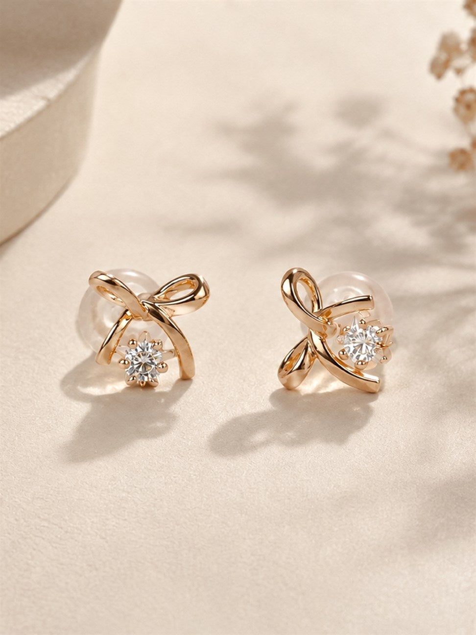 Rose Gold Criss Cross Stud Earrings