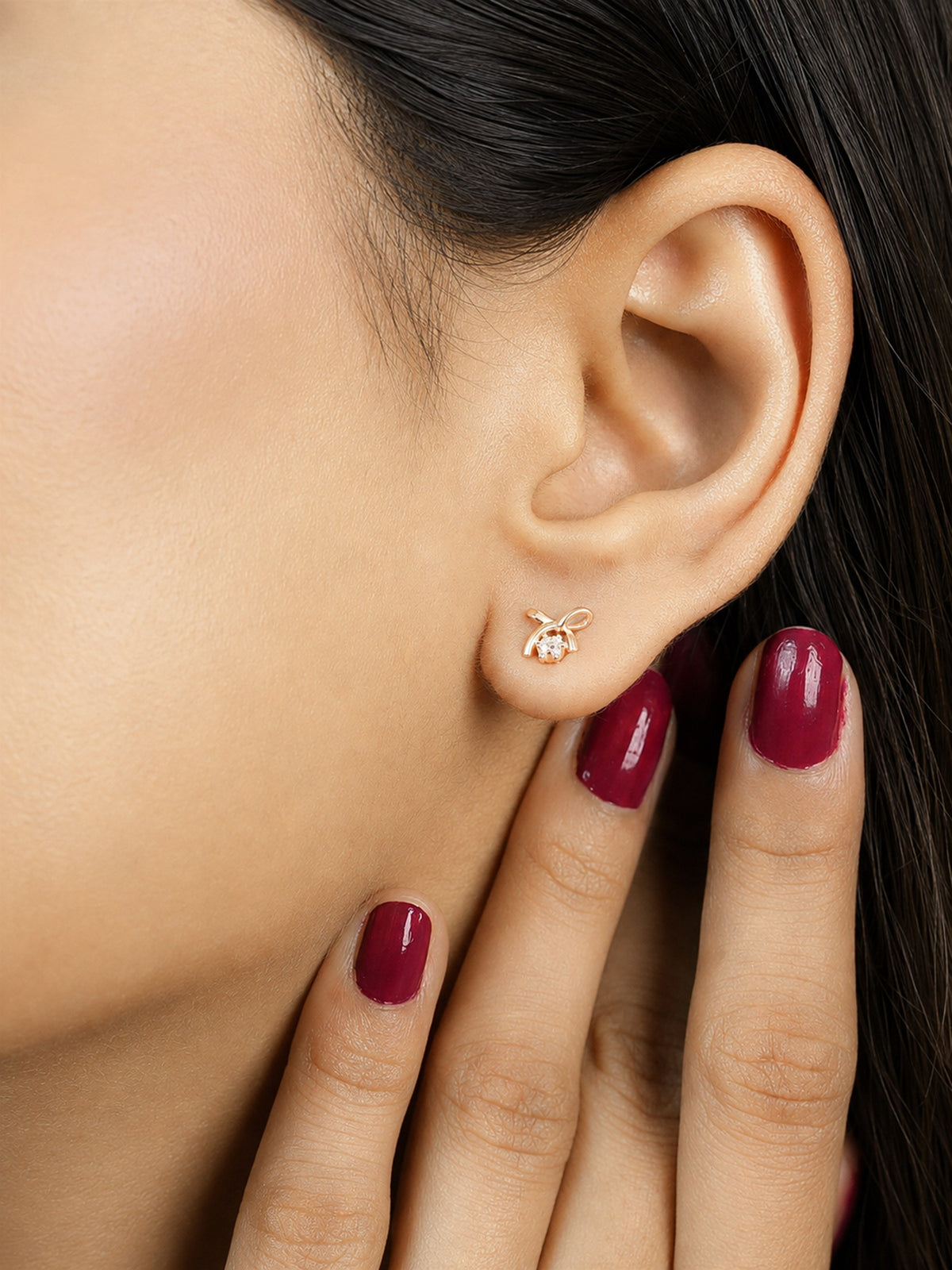 Rose Gold Criss Cross Stud Earrings
